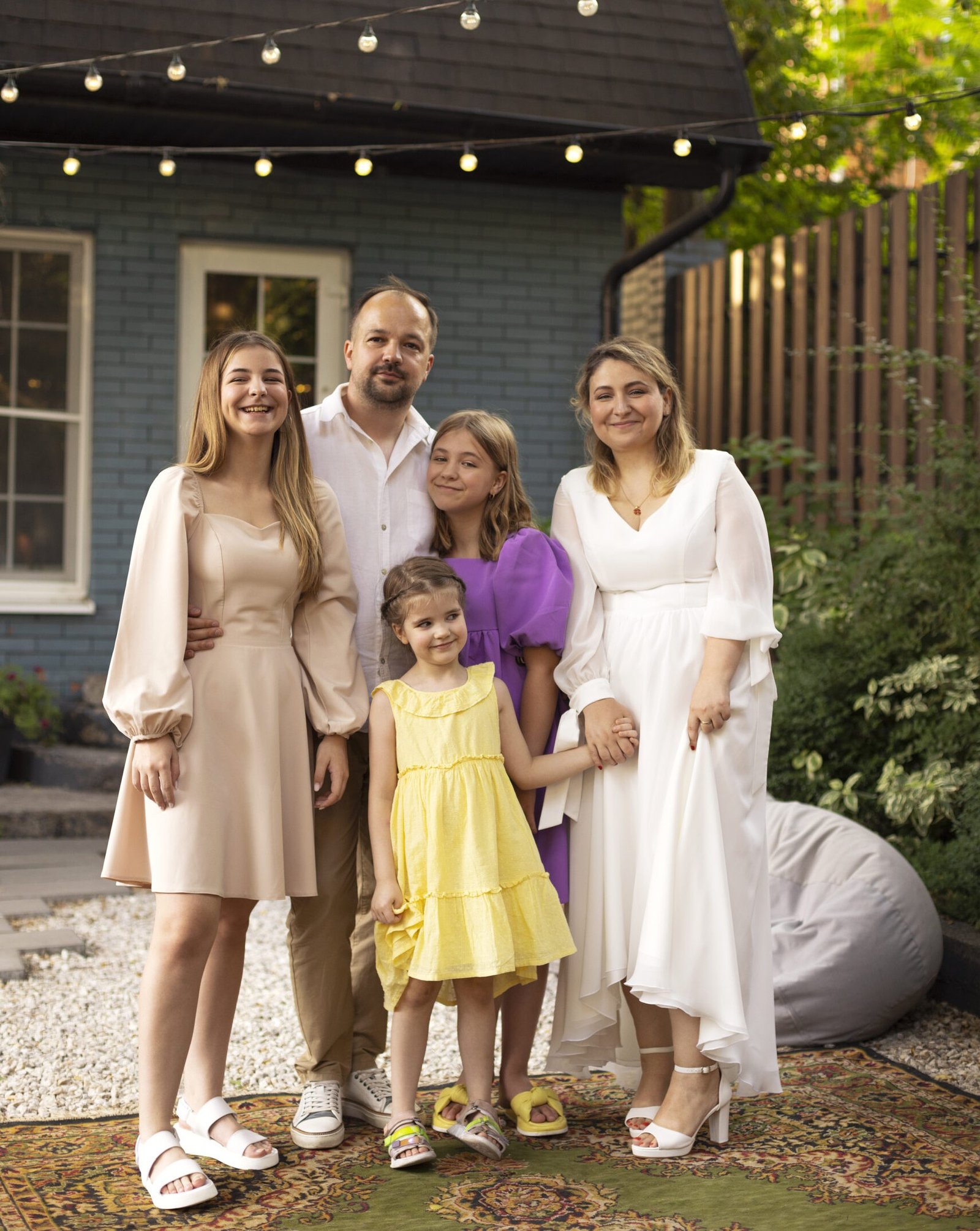 Photo of family on a wedding party for a 20 year anniversary in backyard party High-Income Phaseouts